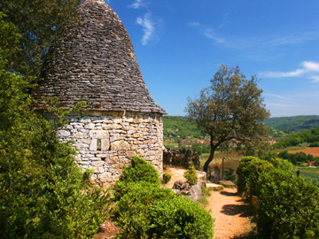 Photo of a stone borie at Marqueyssac gardens, Dordogne, France, by John Hulsey